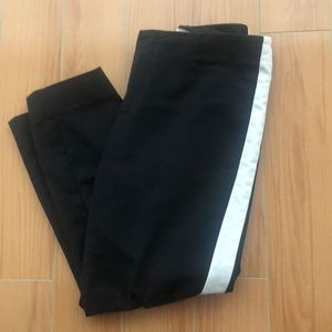 Mid-rise tuxedo style pant with white stripe on the side (28”W and 31”L)